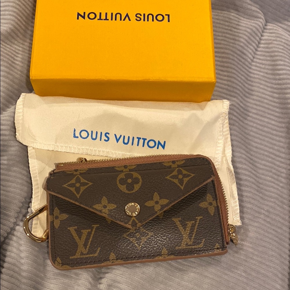 Louis Vuitton Brown Wallet with Iconic Monogram Pattern